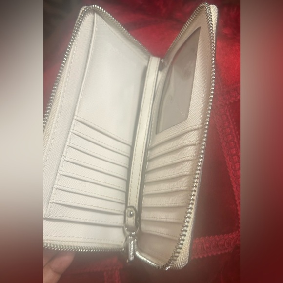 •SALE•Michael Kors Cream Wallet with a Wristlet Strap: Clean Used Condition - Picture 5 of 16